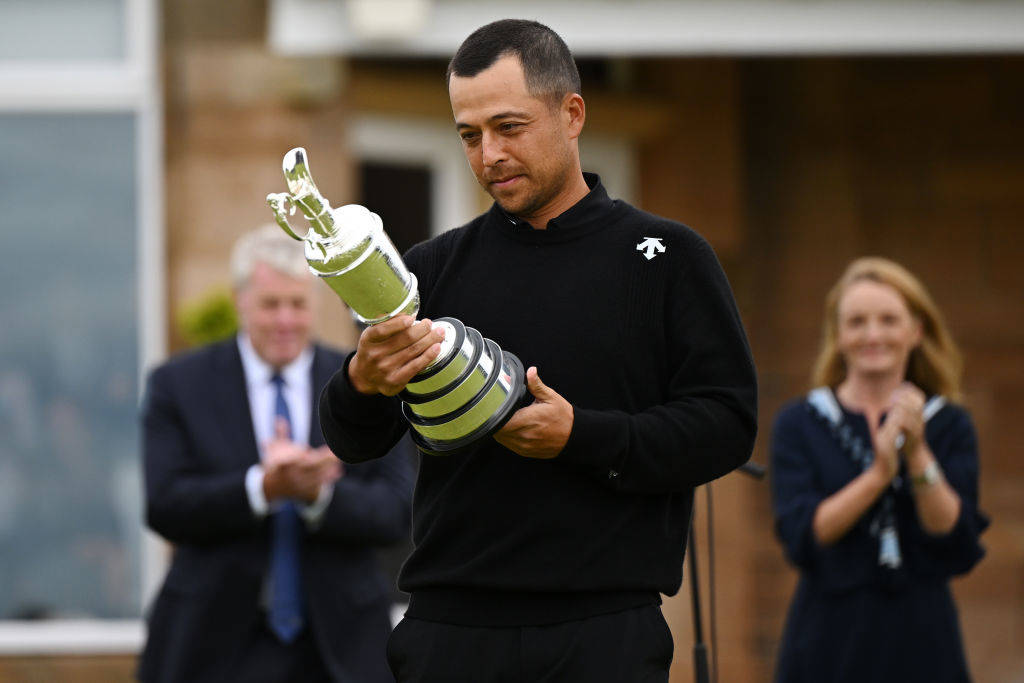 Xander Schauffele looks at the Claret Jug